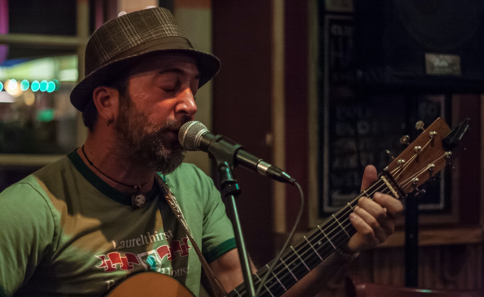 Pearl Street Pub and Cellar Singer on Microphone Boulder CO