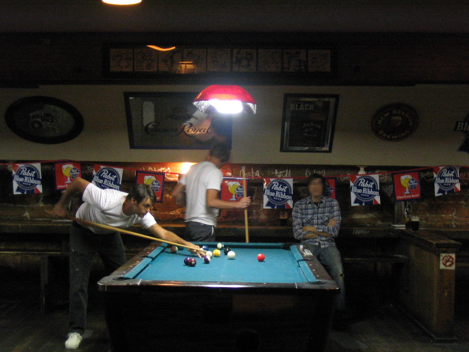 Sun Down Saloon Guys playing pool boulder co